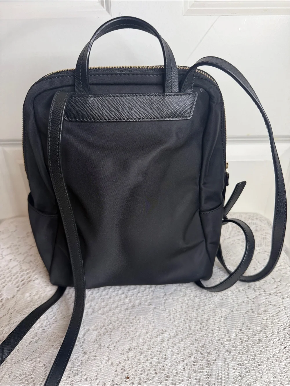 Kate Spade black nylon backpack with gold-tone hardware